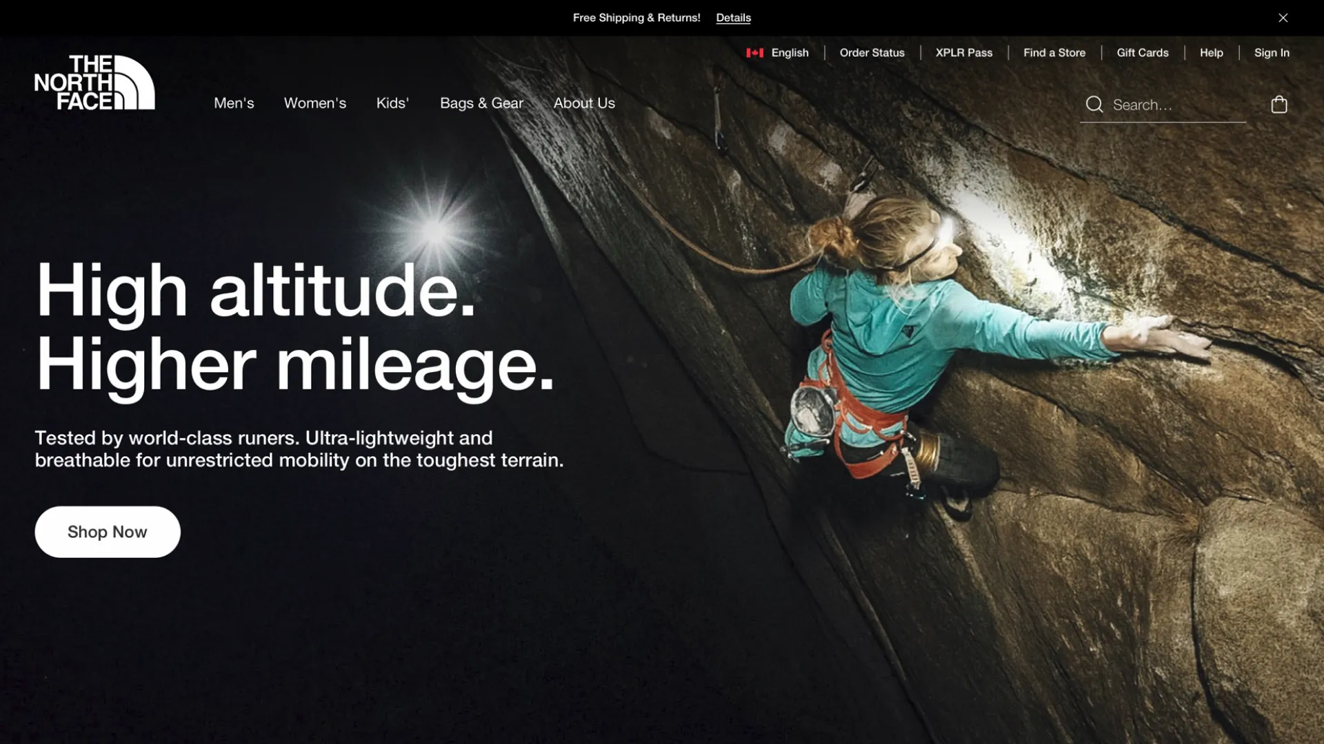 The redesigned homepage: a climber on a night-lit rock face under the headline High altitude. Higher mileage., with a transparent header and a rounded Shop Now button.