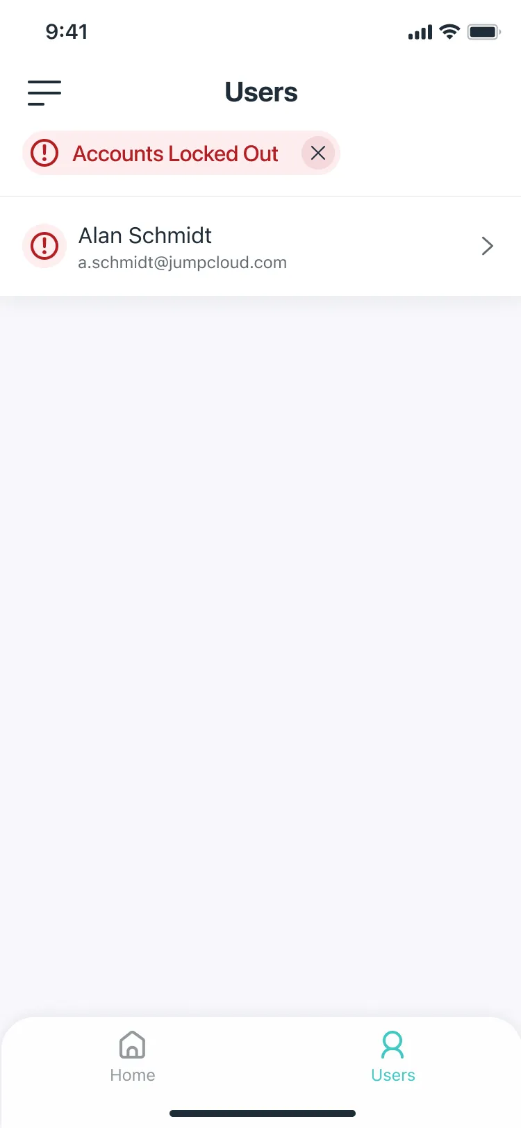 The Users tab filtered by an Accounts Locked Out pill, showing one user, Alan Schmidt.